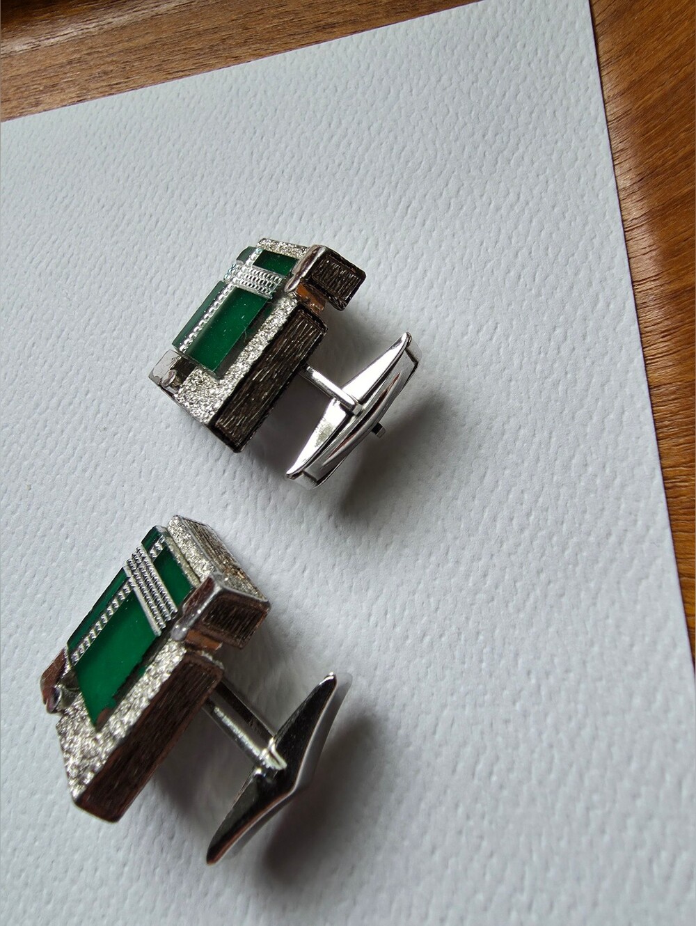 Vntage silver-tone cufflinks featuring rectangular green stone inlays